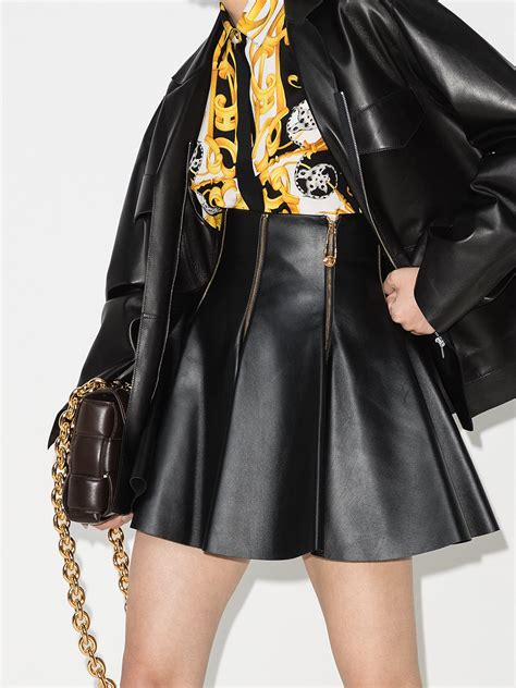 versace leather pencil skirt|Versace pleated mini skirt.